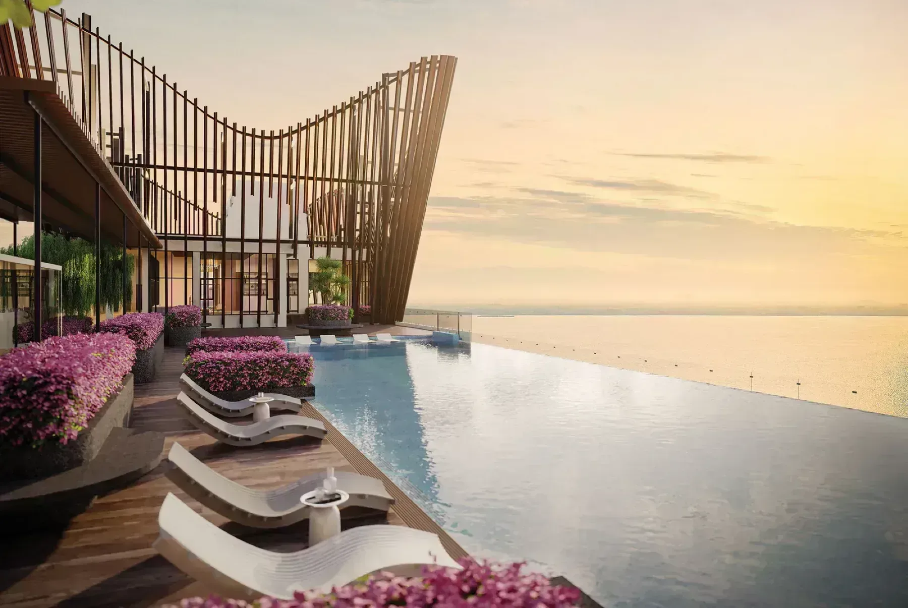 Crown Penang rooftop infinity pool overlooking the sea at sunset