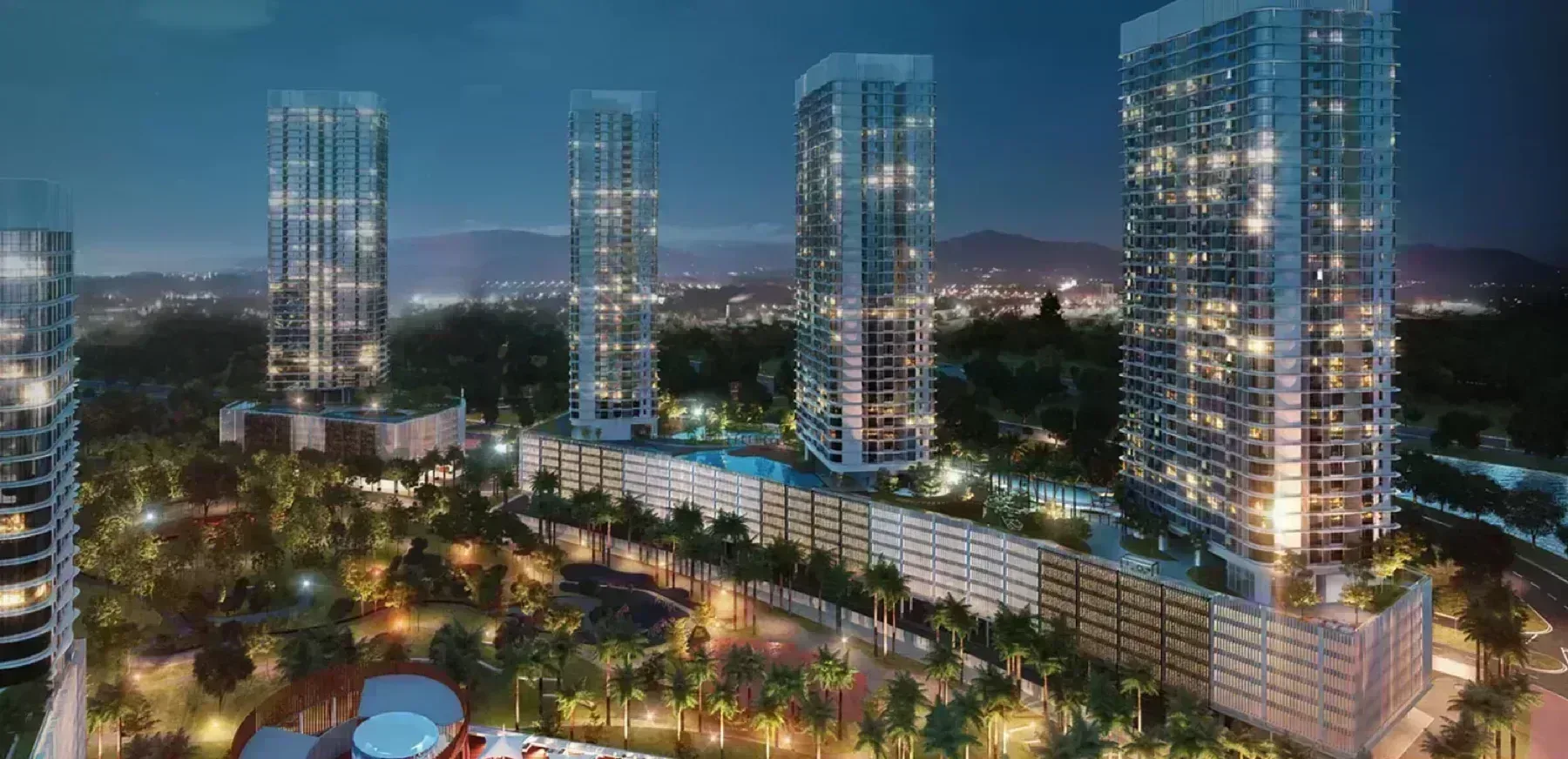 Macrolink Medini three towers at night above the central park, Iskandar Puteri