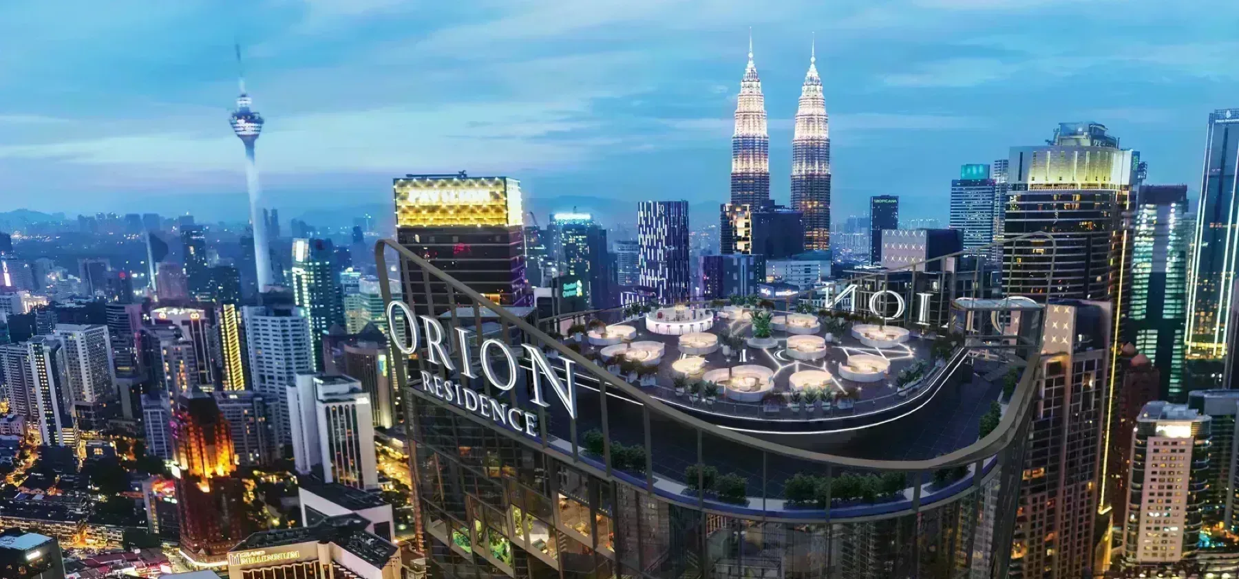 Orion Residence aerial night view of the tower above Bukit Bintang