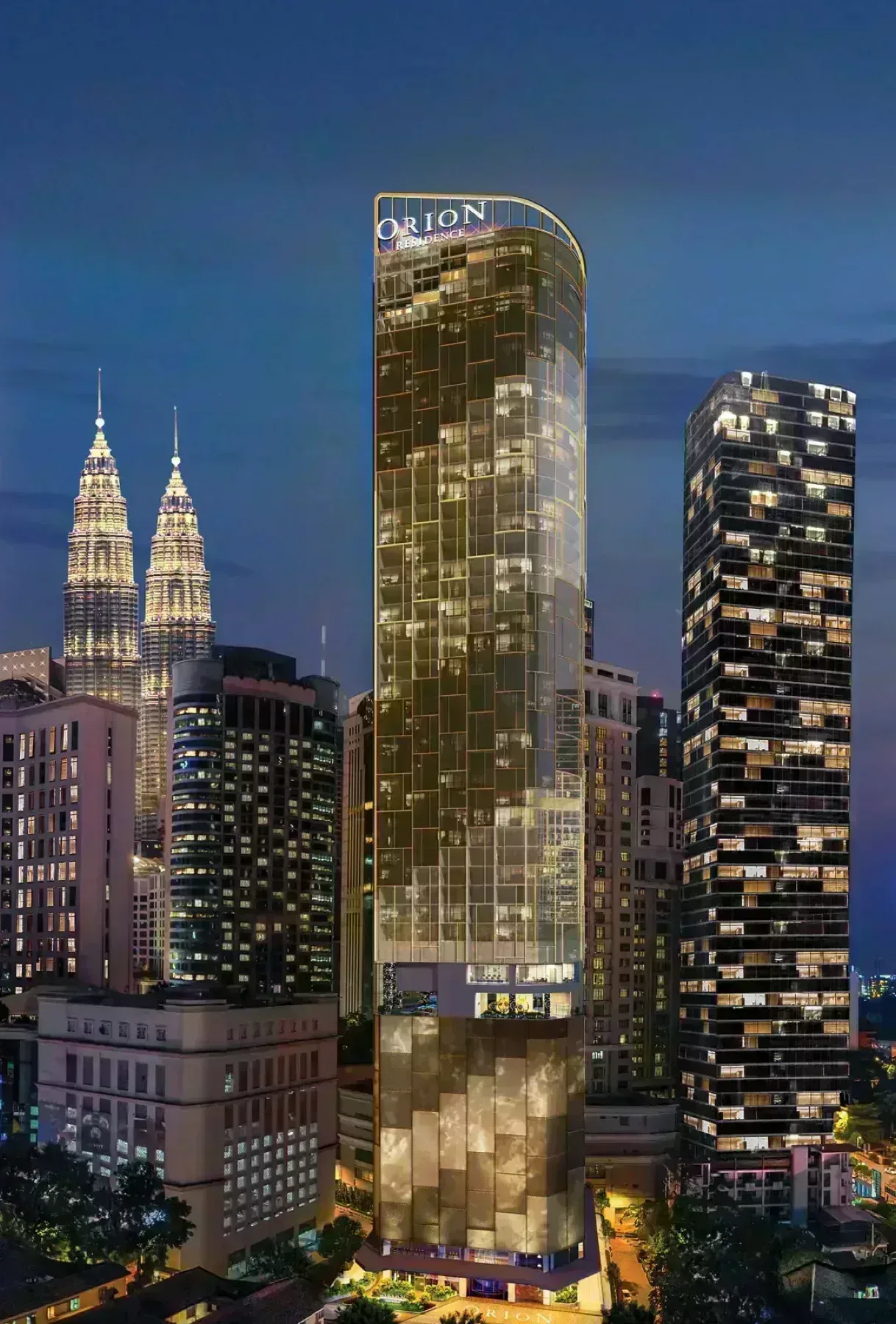 Orion Residence tower exterior at dusk