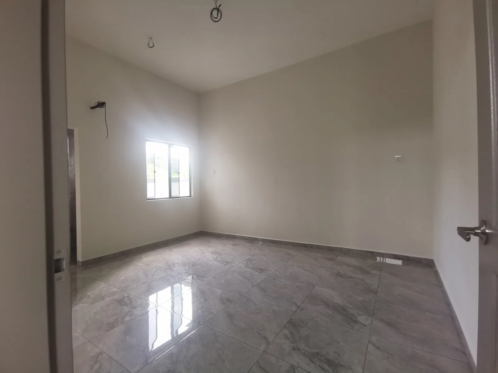 the aster taman sinfar downstairs room